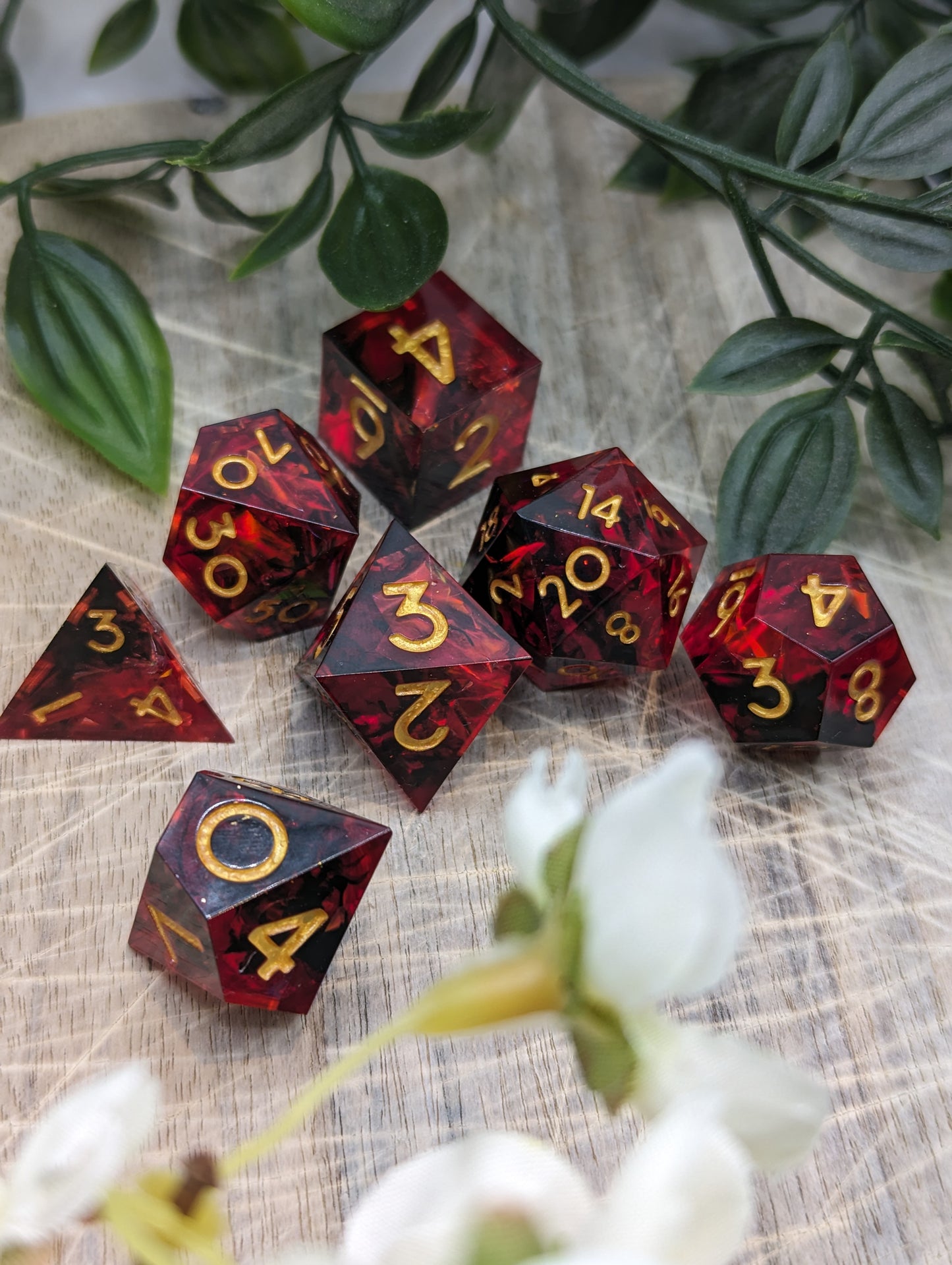Black Gold Red Sharp Edge Resin Dungeons and Dragons Dice Set Angled Group