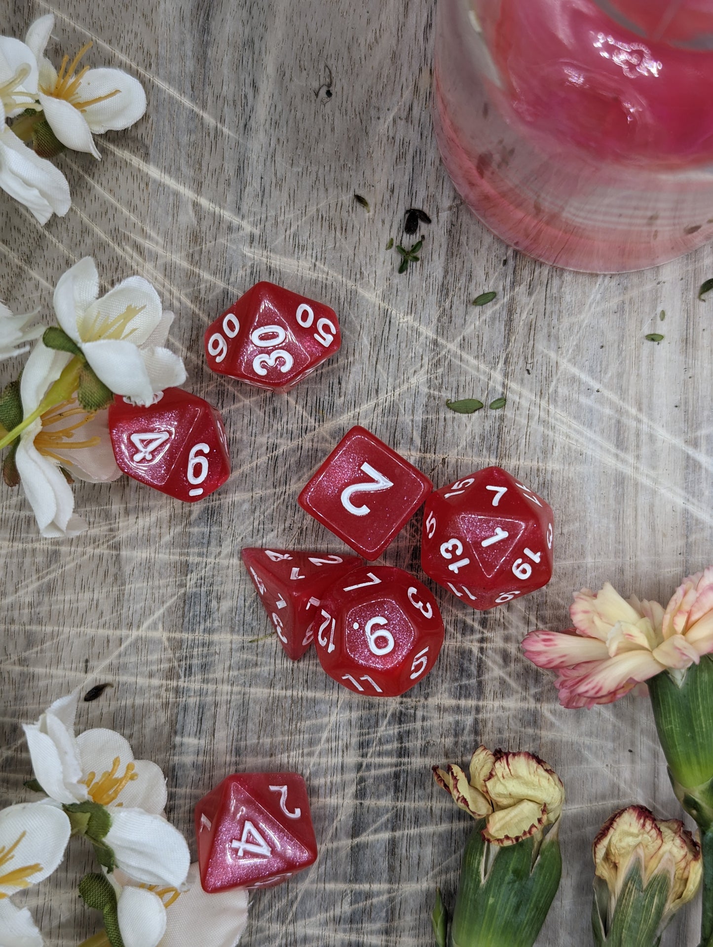 Red Pink Polyhedral Dungeons and Dragons Dice Set Top Down Scatter