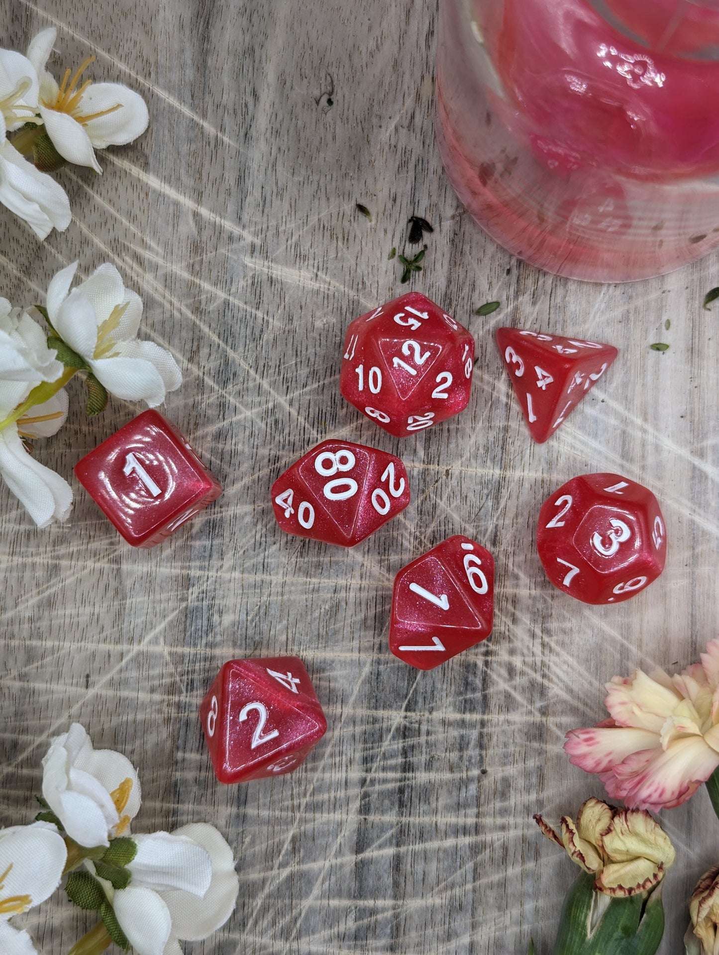 Red Pink Polyhedral Dungeons and Dragons Dice Set Top Down Scatter Variation