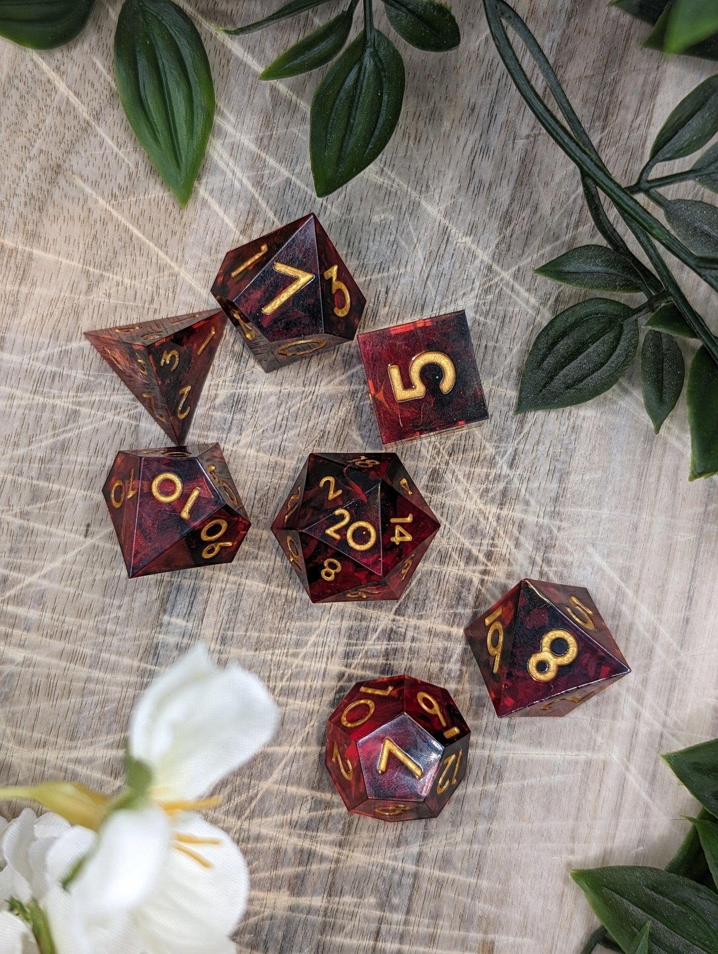 Black Gold Red Sharp Edge Resin Dungeons and Dragons Dice Set Top Down