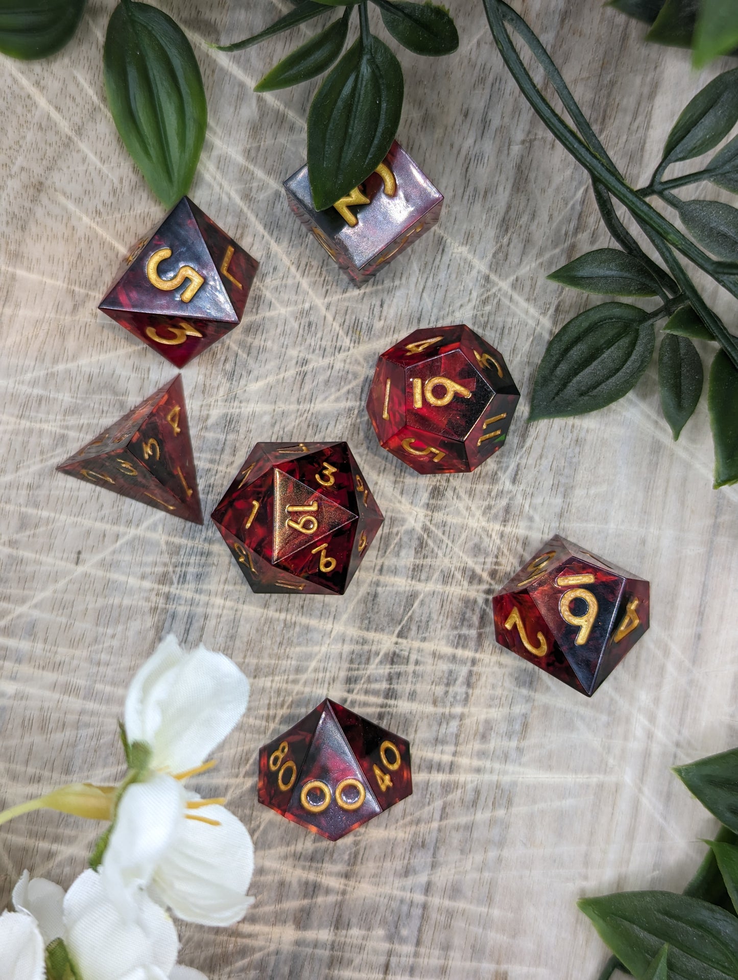 Black Gold Red Sharp Edge Resin Dungeons and Dragons Dice Set Top Down Scattered