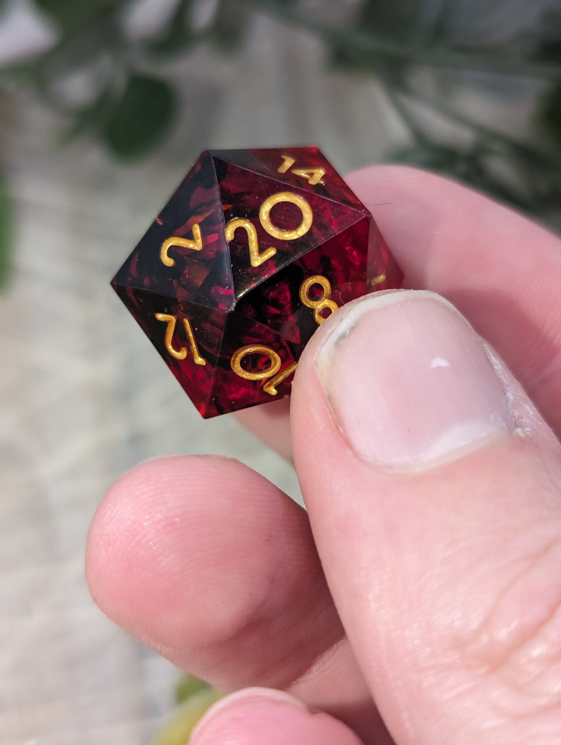 Black Gold Red Sharp Edge Resin Dungeons and Dragons Dice Set D20 Close Up