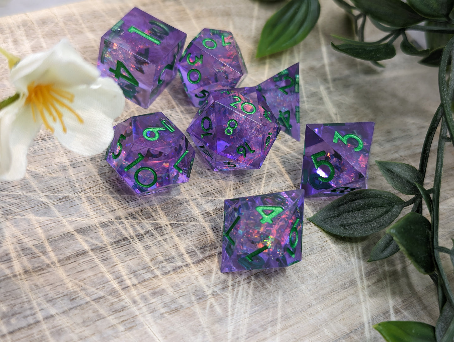 Purple & Green Sharp Edge Polyhedral Dungeons and Dragons Dice Set Low Angle Details