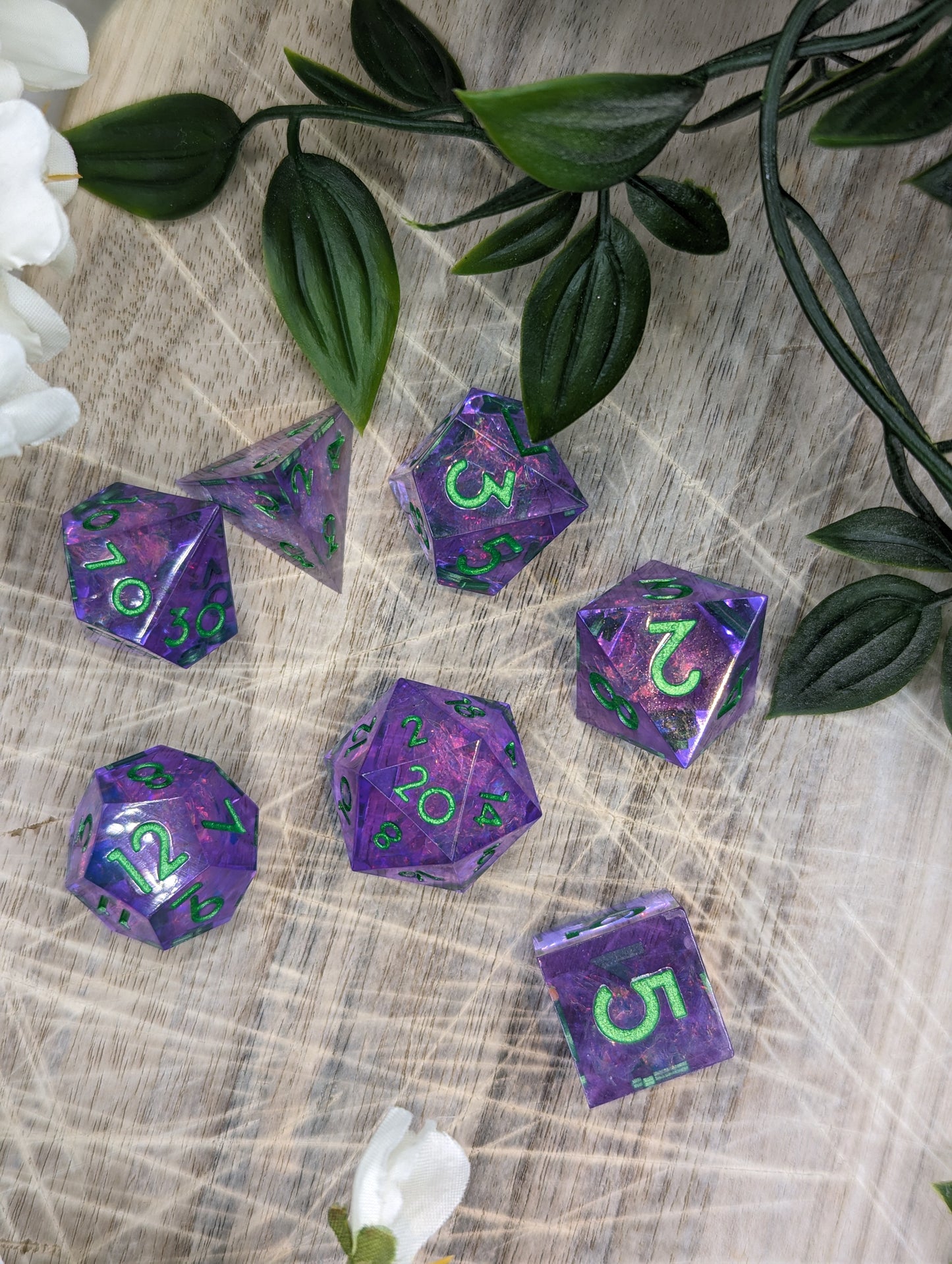 Purple & Green Sharp Edge Polyhedral Dungeons and Dragons Dice Set Top Down