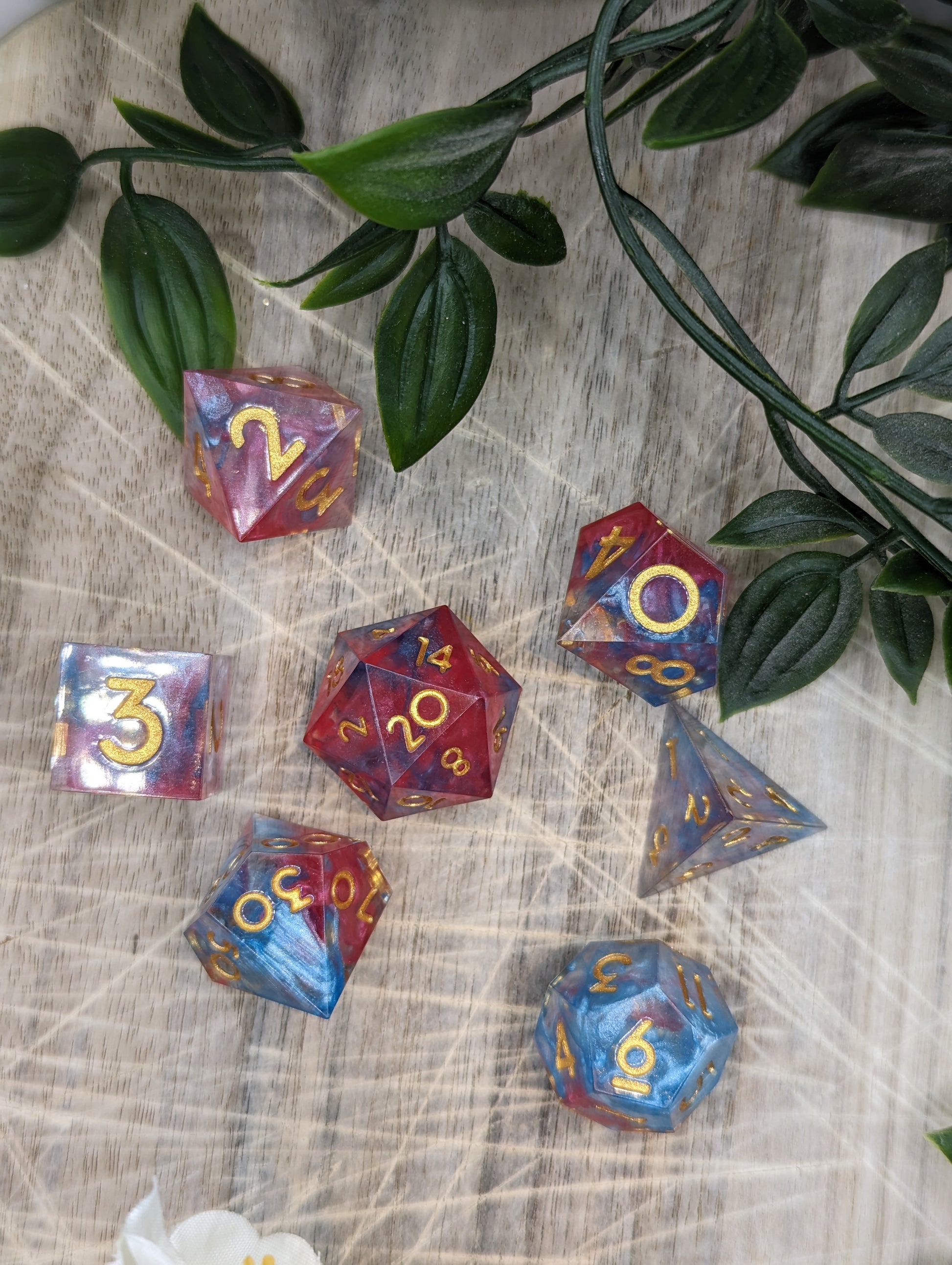 Pink, Blue and Gold Sharp Edge Dice Set Top Down