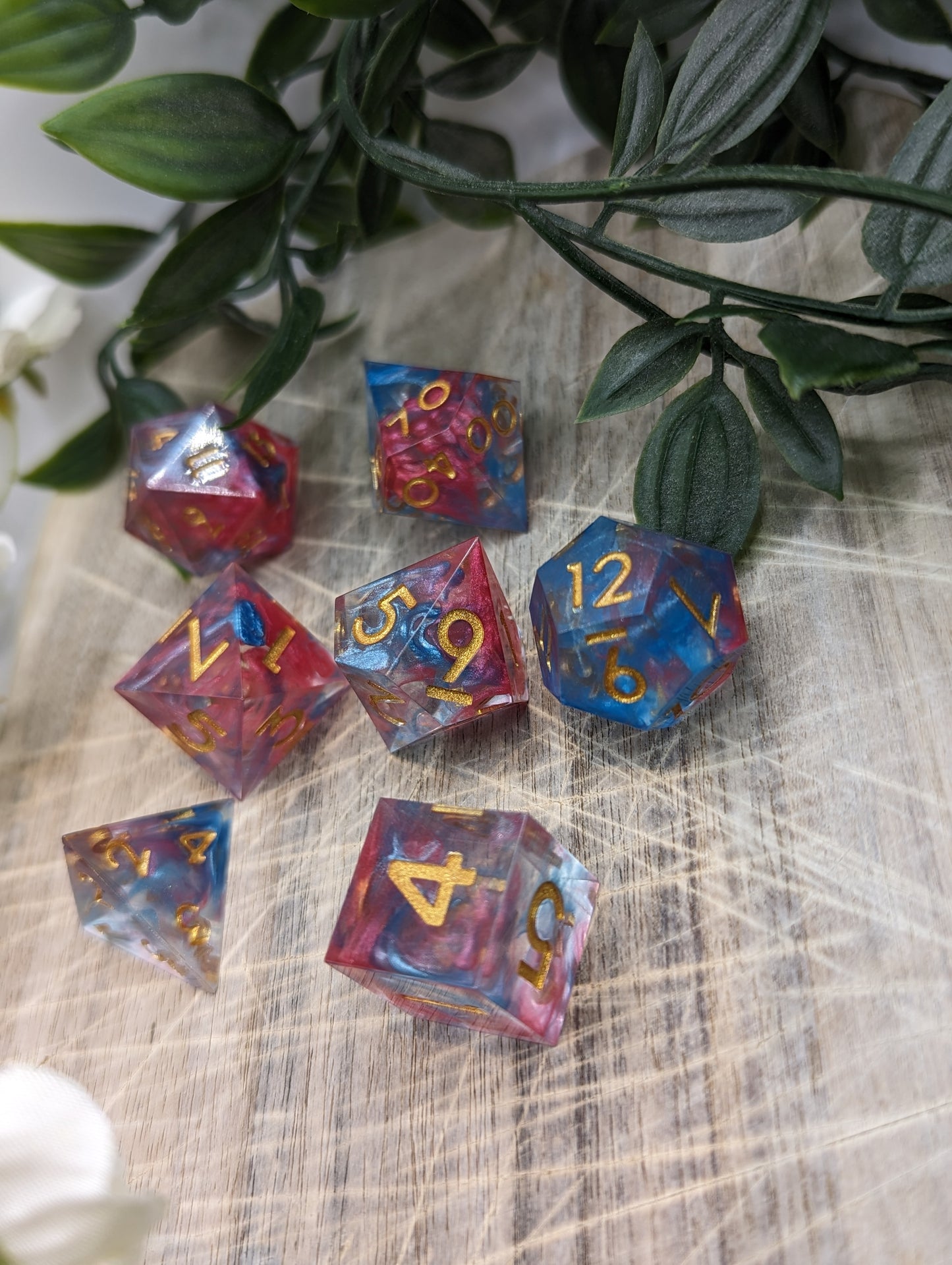 Pink, Blue and Gold Sharp Edge Dice Set Angle Shot Variation